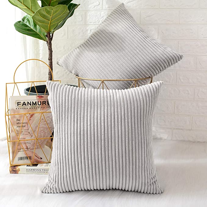 striped feel throw pillows - 20 decor ideas to make your apartment look expensive