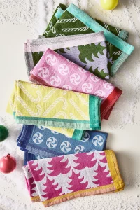 A colorful, jacquard set of Kringle Jacquard Napkins. Festive and a perfect top rated Anthropologie gift for holiday entertaining.