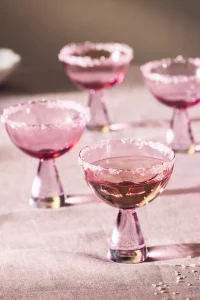 Two-toned, handblown Ramona Coupe Glasses, Set of 4. Elegant top rated Anthropologie gifts for a celebratory occasion or cocktail bar.