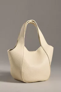 The Sonia Mini Slouchy Tote Bag in cream. A practical yet fashionable handbag and one of the best top rated Anthropologie gifts for her.